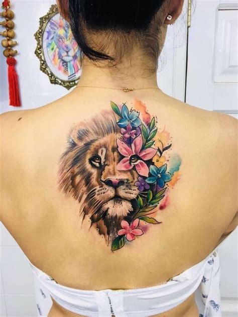 lion and lioness tattoo|lion back tattoo female.